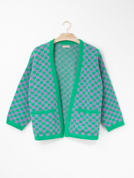 Checkerboard Alpaca Cardigan in a relaxed boxy fit, crafted from a soft alpaca blend with a black and natural checkerboard pattern, open front and front patch pockets.
