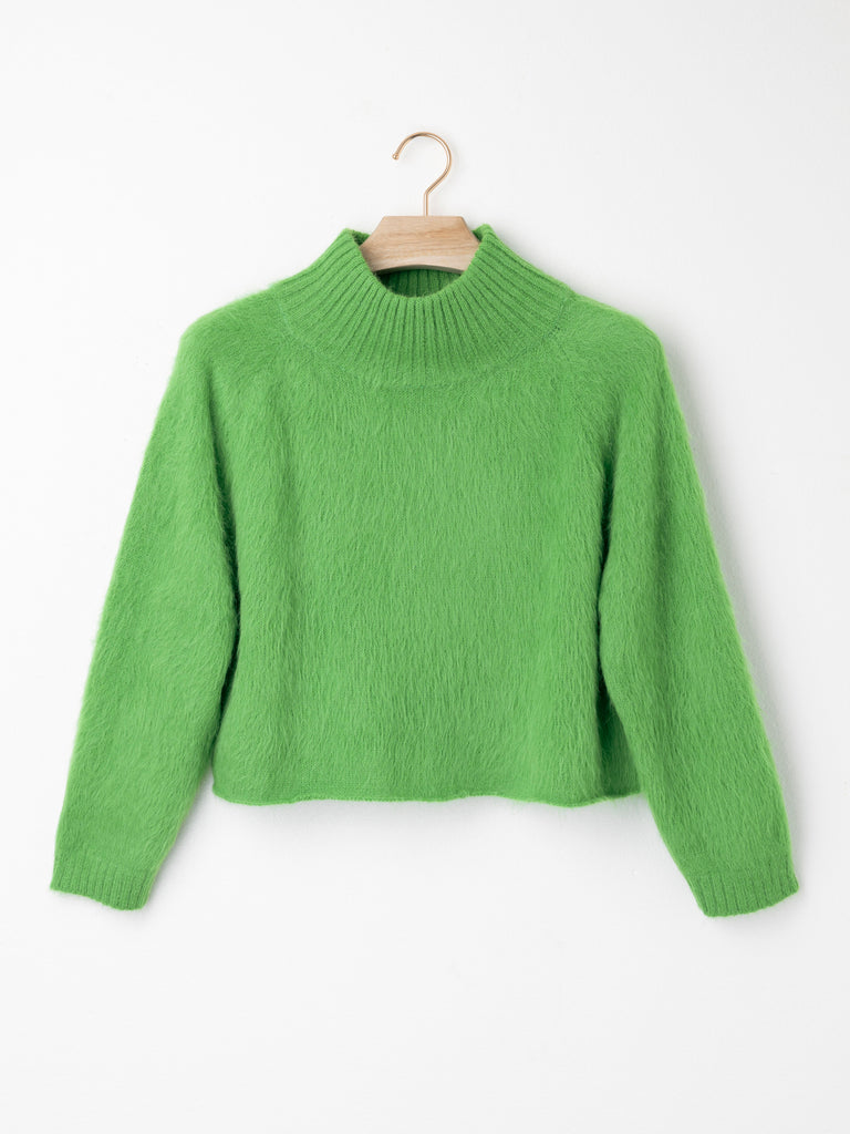 High Neck Cropped Suri Alpaca Jumper crafted from lightweight Suri Air yarn with a folded high neckline, relaxed cropped silhouette and streamlined sleeves.